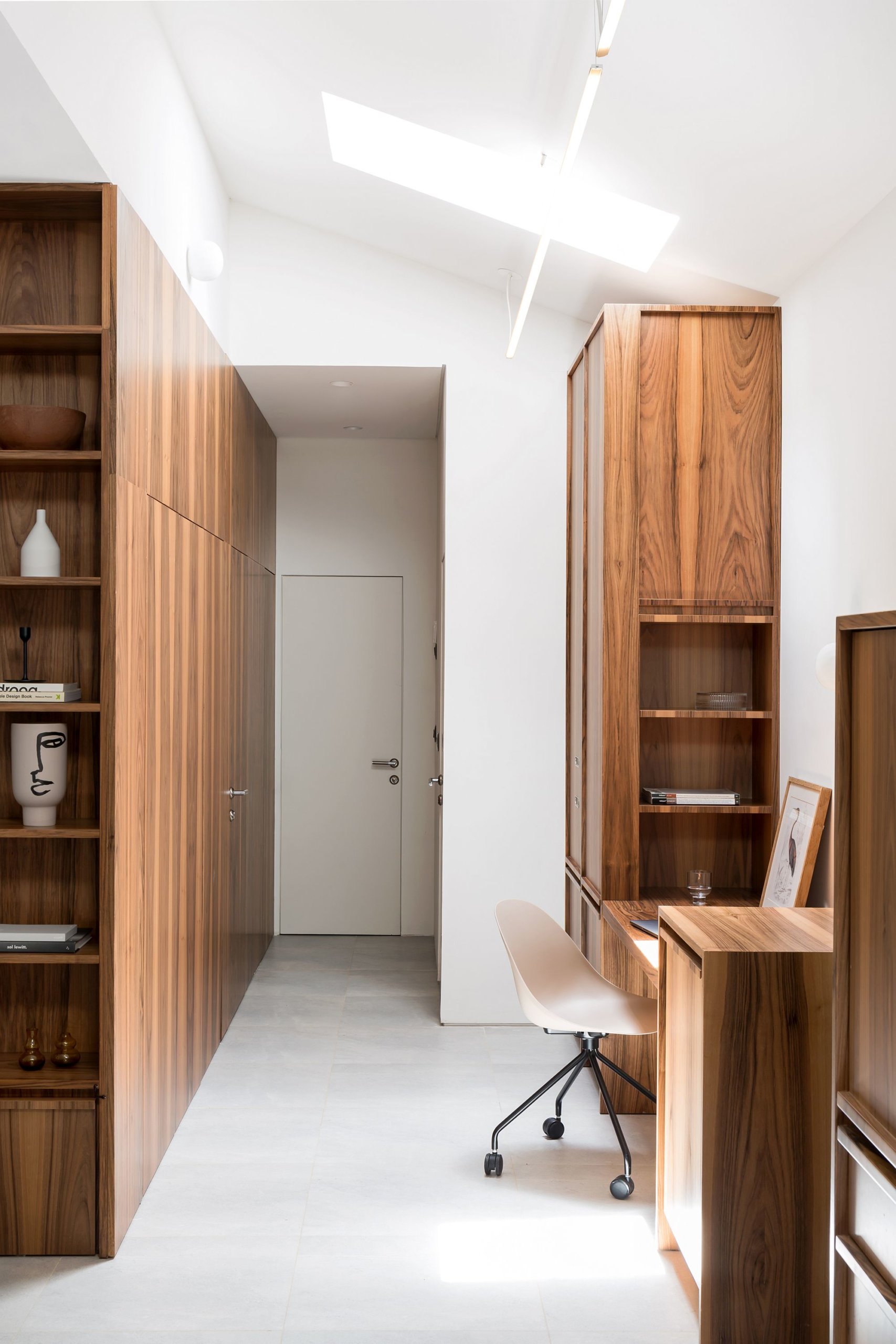 Beautiful carpentry inside the house hides all the many books and documents inside the house