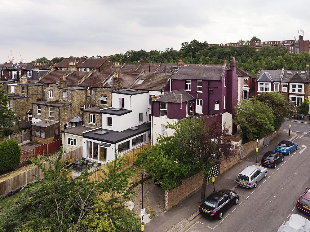 Contemporary makeover of the multi-tiered Victorian home in North London is apparent even from a distance