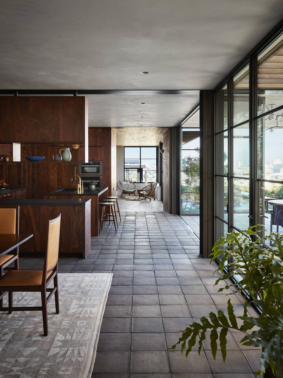 Custom walnut shelves and interiors used throughout the house were reclaimed from preious projects