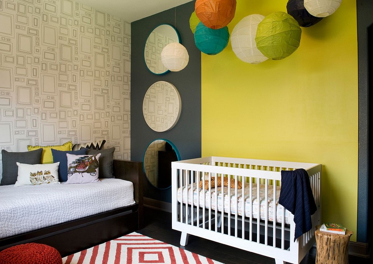 Dak gray coupled with yellow in the gorgeous modern nursery with a rug that adds pattern to the space