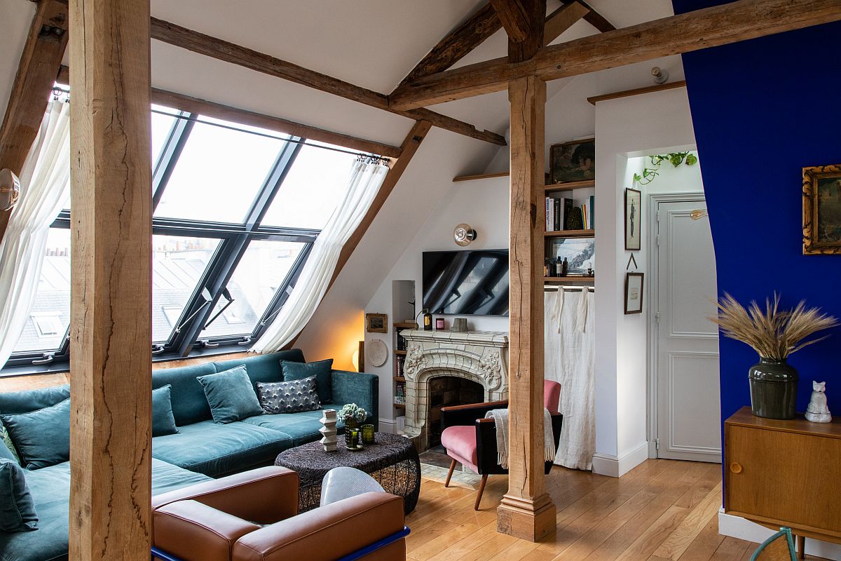 Fabulous contemporary living room of Paris home with a large blue sectional