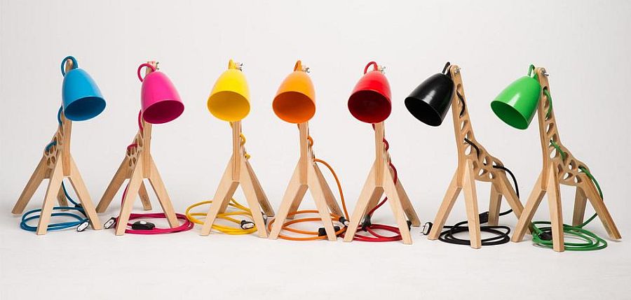 Giraffe-shaped table lamp comes with different colored lamp shades that make it more exciting