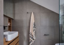 Gray-bathroom-with-floating-wooden-vanity-and-white-sink-77448-217x155