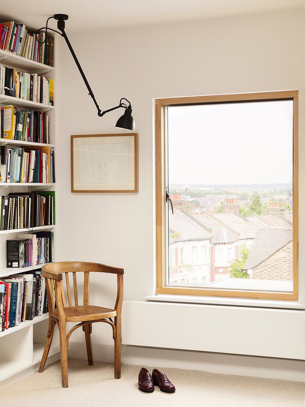 Home office and reading room on the upper level with natural light and flexible sconce light