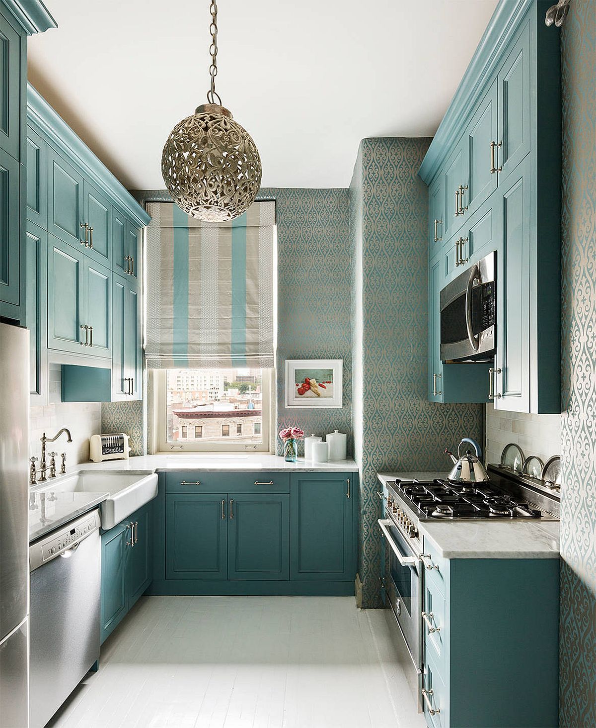 Light-turquoise-cabinest-coupled-with-a-pattern-filled-backdrop-in-the-small-kitchen-42963