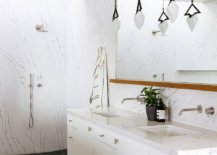 Marble-finishes-and-countertops-in-the-bathroom-are-coupled-with-dark-stone-flooring-51723-217x155