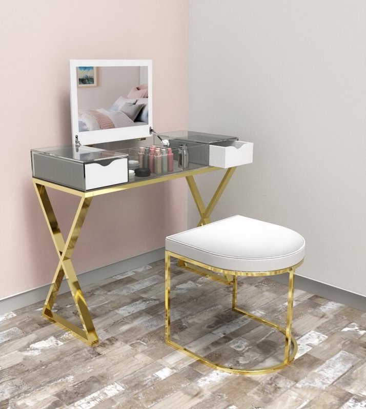 Metal vanity stool with a curved gold-toned base