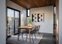 Modern-dining-room-with-a-flood-of-sunlight-wooden-ceiling-and-a-modern-minimal-table-and-chairs-74562-217x155