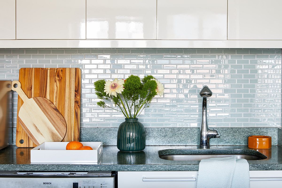 Modern kitchen of Upper East Side Condo with subway-tiled backsplash