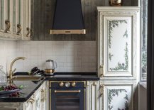 Ornate-pattern-for-the-cabinets-coupled-with-copper-trims-for-the-hood-and-the-appliances-gives-this-kitchen-a-Victorian-vibe-56319-217x155