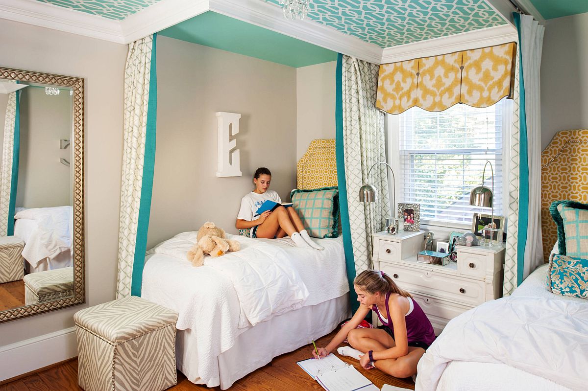 Placing one of the beds in the corner creates more space in the shared teen bedroom