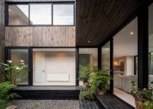 Sliding-glass-doors-with-steel-frame-and-wood-shape-the-exterior-of-the-house-12879-217x155