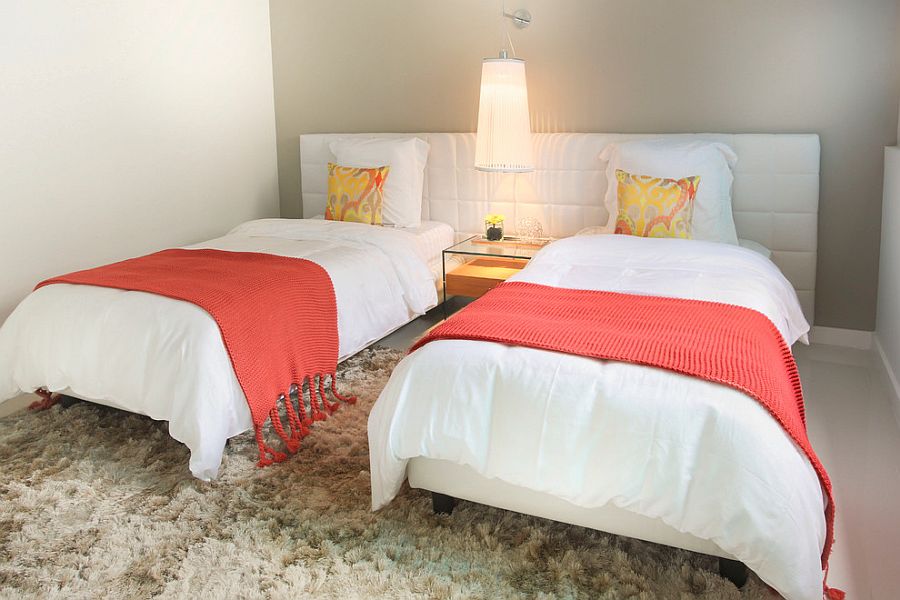 Small bedroom with gray accent wall combines coastal touches with contemporary style