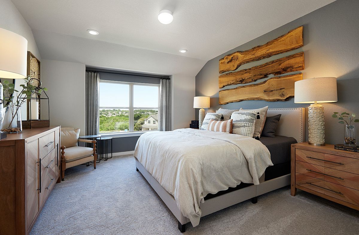 Strips of natural wood make the gray accent wall extra-special in here!