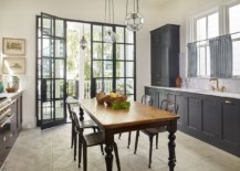 Table-in-wood-at-the-heart-of-the-kitchen-serves-both-as-dining-space-and-prep-zone-12529-217x155