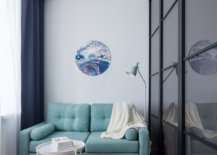 Tiny-light-blue-sofa-for-an-ultra-small-living-area-inside-small-studio-apartment-66157-217x155