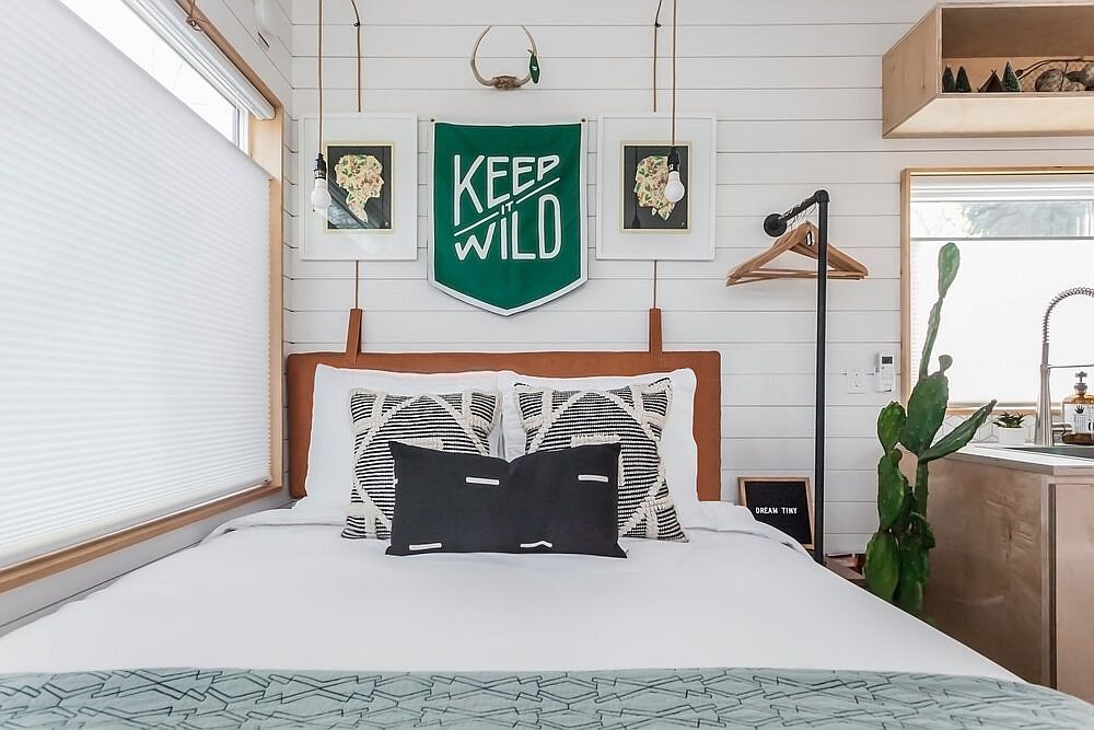 Ultra-small bedroom of the tiny house with ample natural light and a space-savvy design