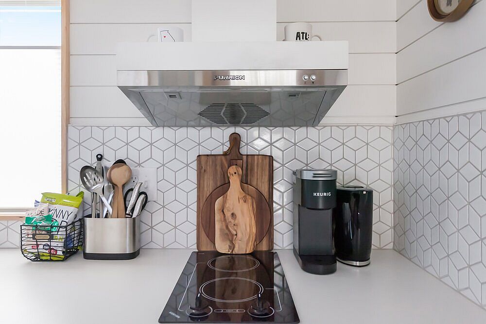 Using geometric tiles for the backsplash in the kitchen