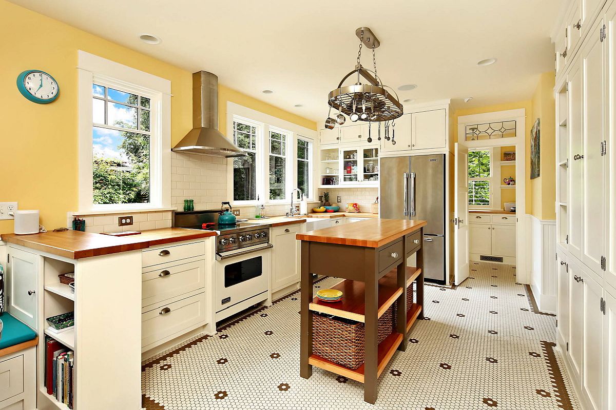 White and yellow modern Victorian kitchen for a home with rich Victorian era heritage