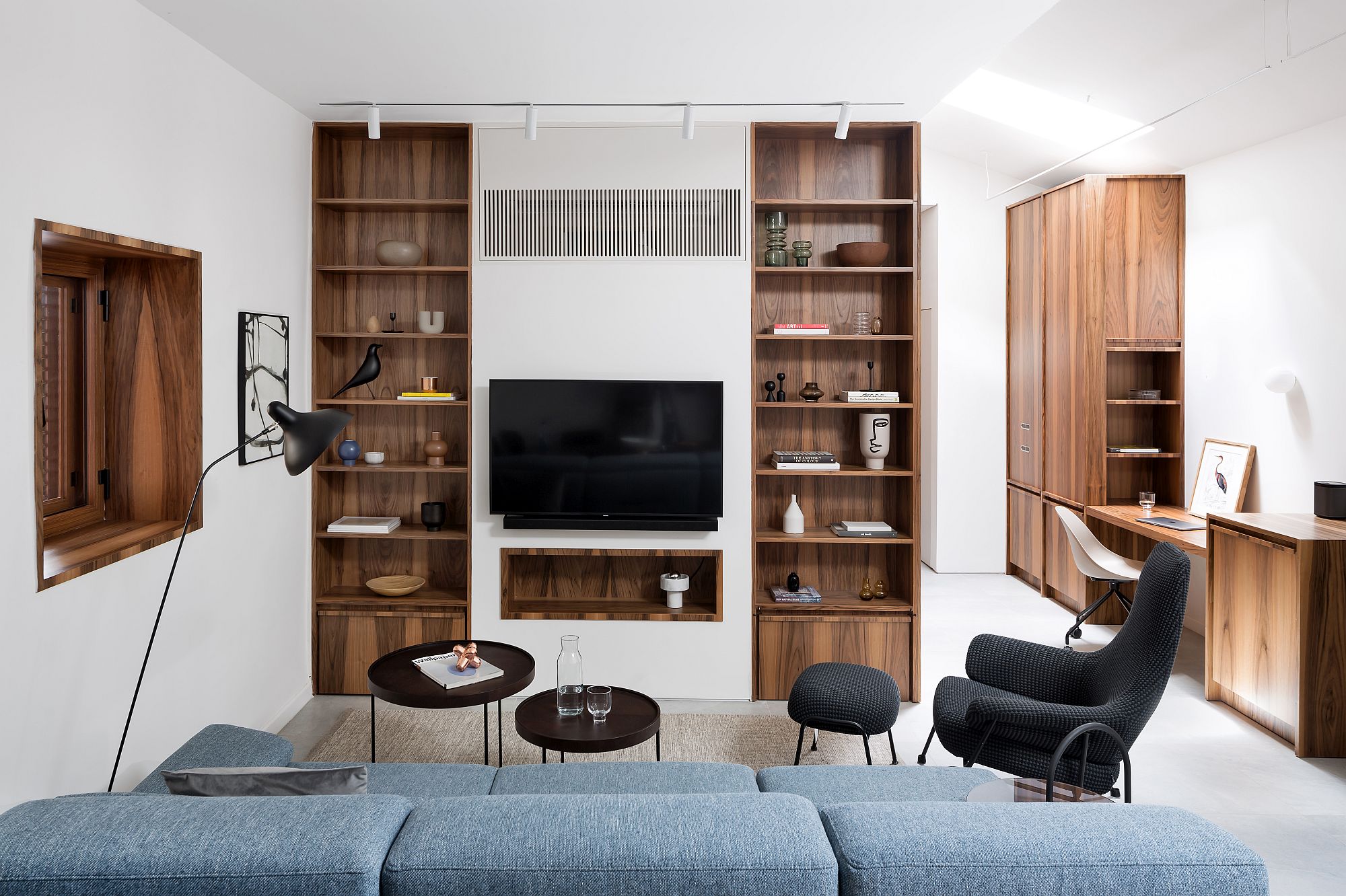 Wooden-shelves-next-to-the-television-add-to-the-unique-appeal-of-the-living-room-45041