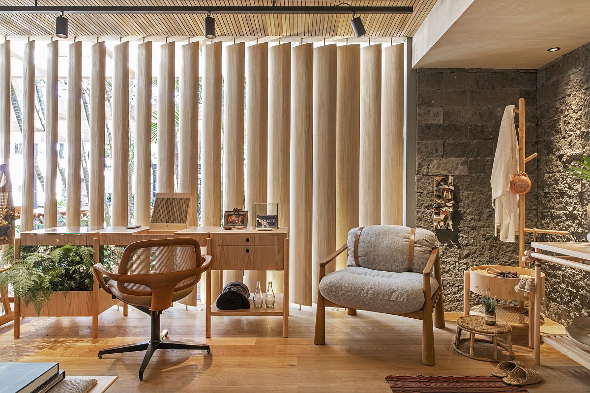 Wooden slats and brise soleils bring the outdoors inside at this exquisite and unique home