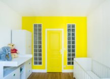 Yellow-accent-wall-and-door-create-a-stunning-visual-focal-point-in-this-contemporary-Paris-nursery-12801-217x155