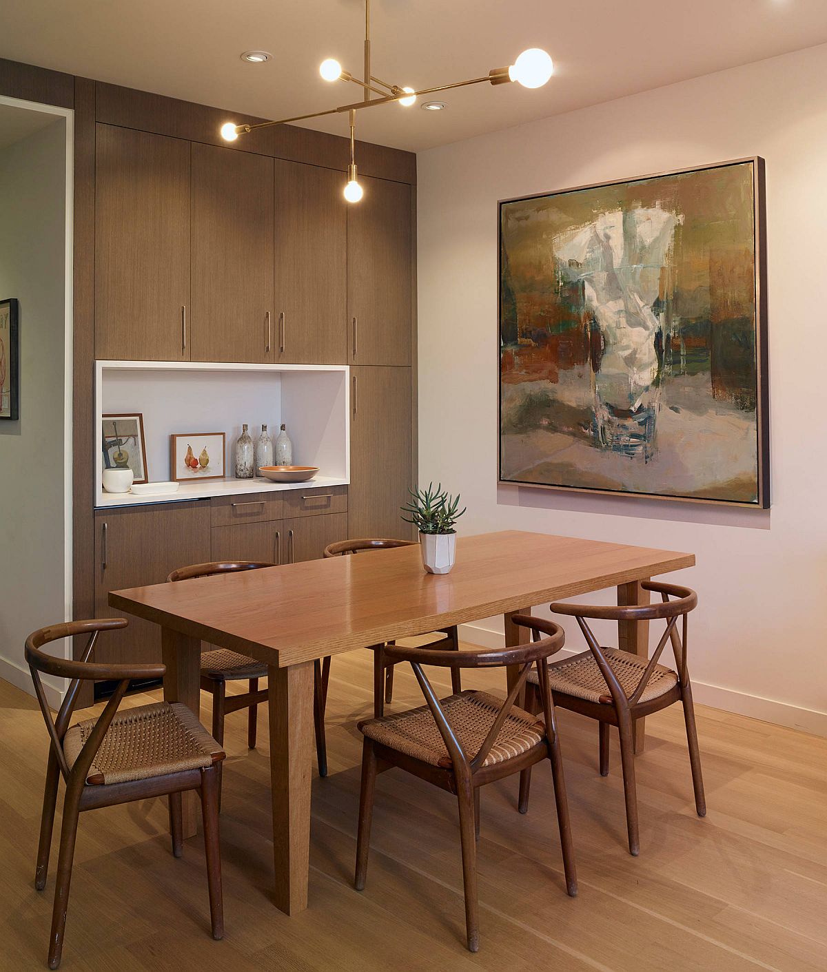 Asian style influences are combined with minimal style in this beautiful dining room