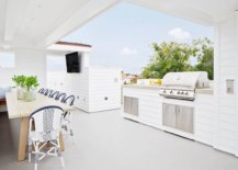 Awesome-rooftop-outdoor-kitchen-with-a-cheerful-beach-style-and-a-covered-dining-space-next-to-it-45711-217x155