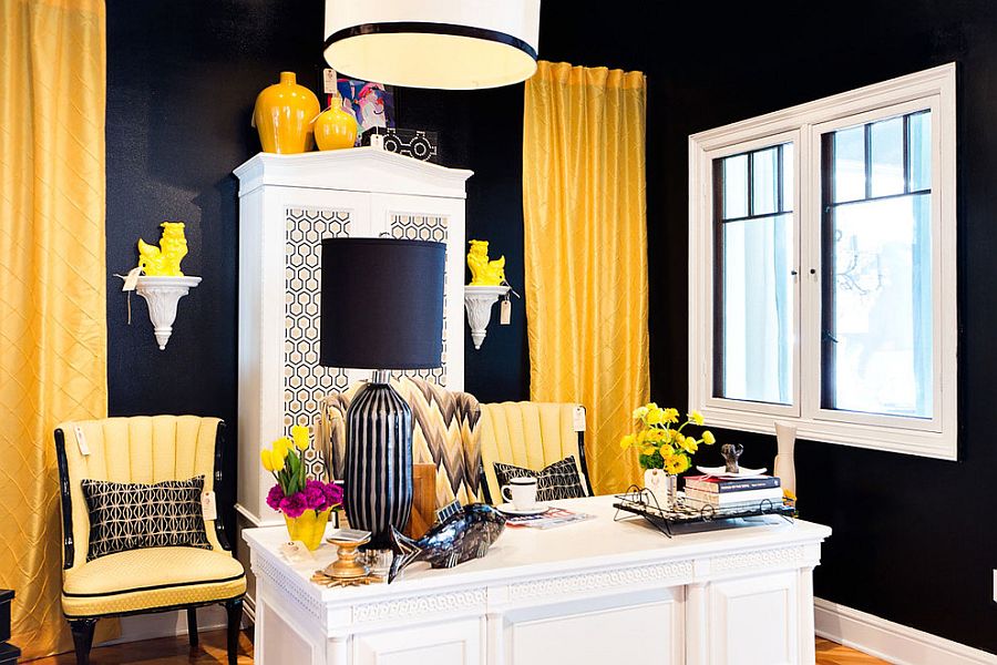 Black walls in this home office accentuate the brilliant yellow accents and limited use of white