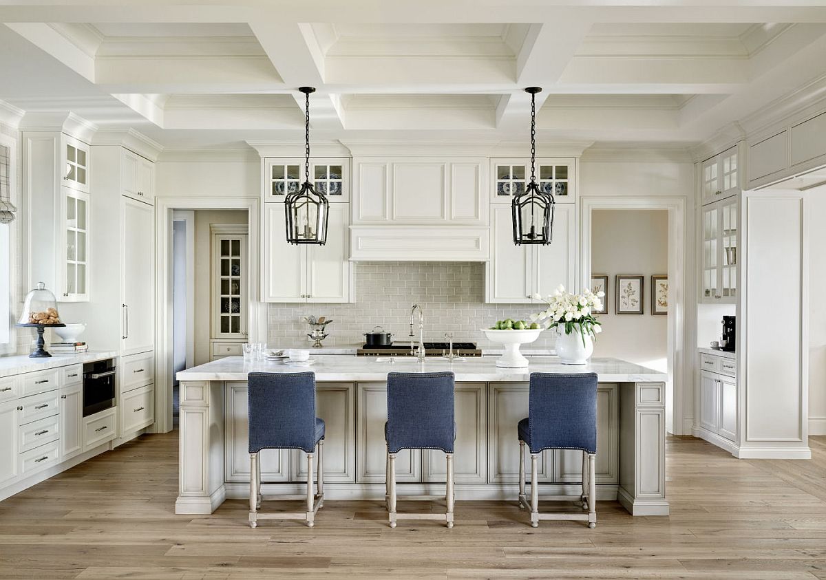 Blue accent bar chairs for the modern kitchen in white with plenty of storage space