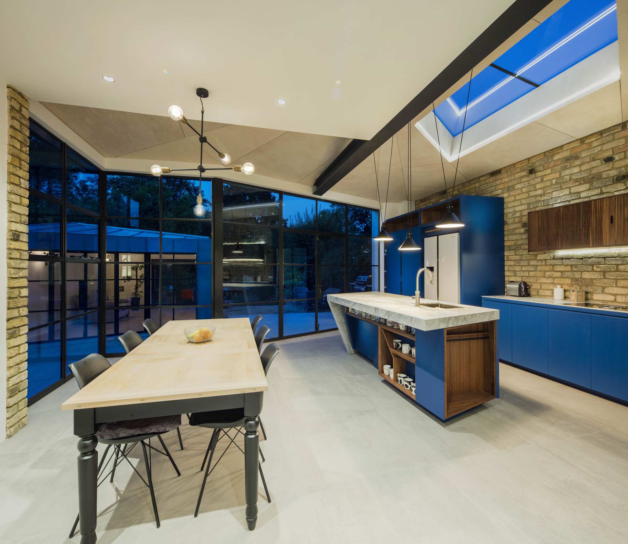 Blue makes the biggest impression inside the new kitchen and dining area