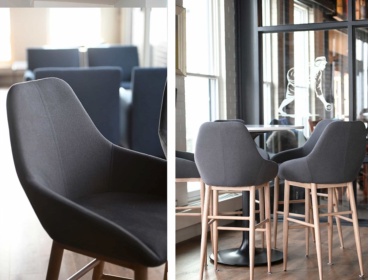 Comfortable gray bar chairs for the lounge bring modernity to the setting