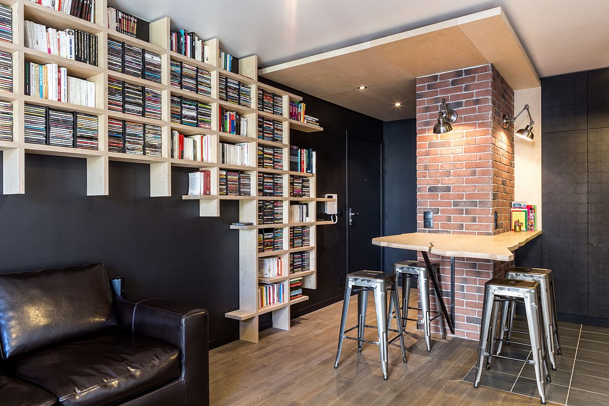 Creative wooden bookshelves packed with books make the biggest impression in this family room