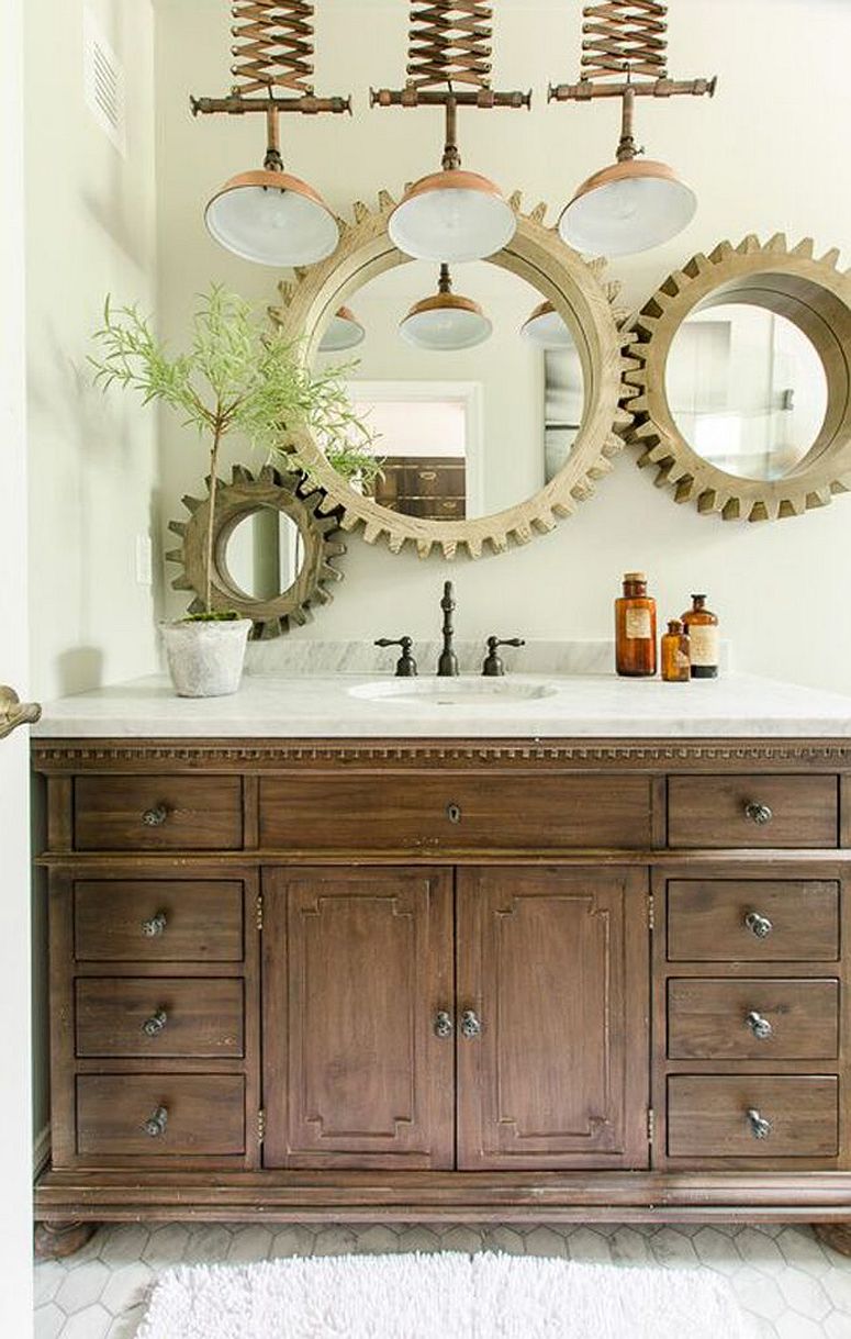 Custom lighting and cog-styled mirror frames give the bathroom a unique look