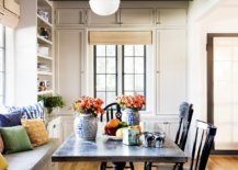 Dark-ceiling-beams-high-ceiling-and-large-windows-give-this-modern-Mediterranean-dining-room-a-unique-appeal-65242-217x155