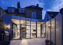 Dark-framed-glass-walls-connect-the-kitchen-and-dining-area-with-the-garden-58341-217x155