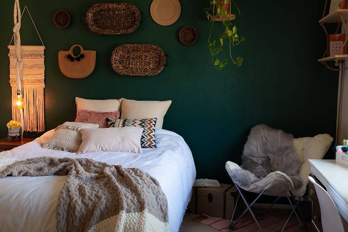 Dark walls, custom decor and unique textiles create a lovely bedroom with modern bohemian style