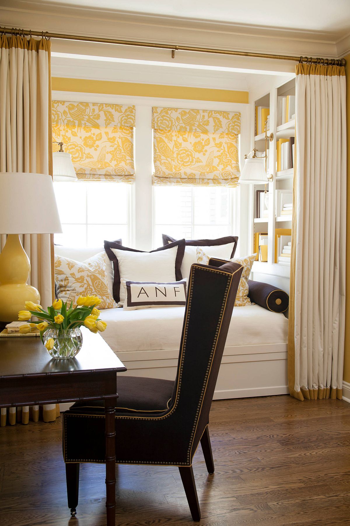 Drapes for the reading nook give a sense of privacy while delineating the space elegantly