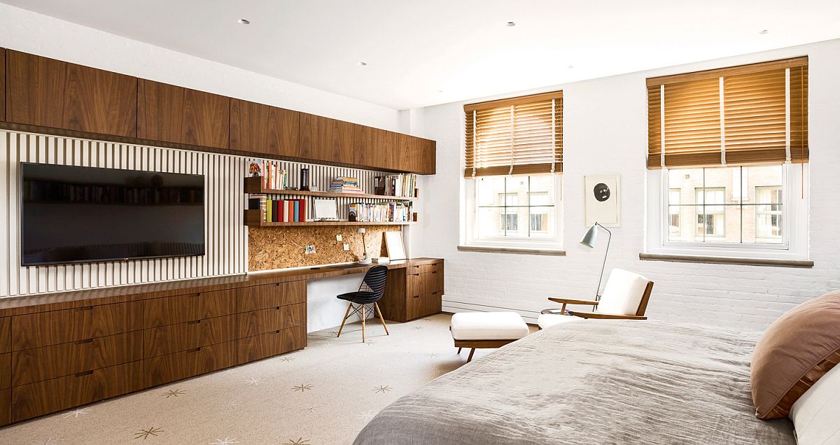 Fabulous custom wooden cabinets and wardrobe along with entertainment unit for the modern bedroom