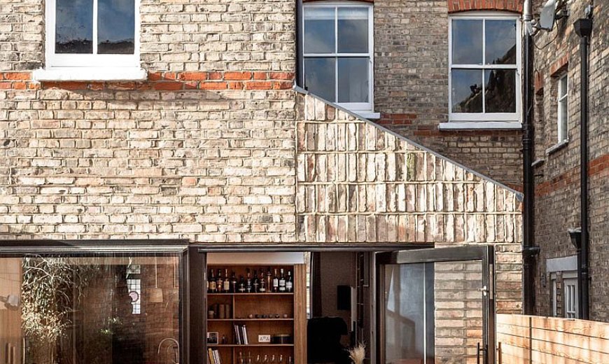 Modern Classic: Cheerful Recycled Brick Extension of North London Home