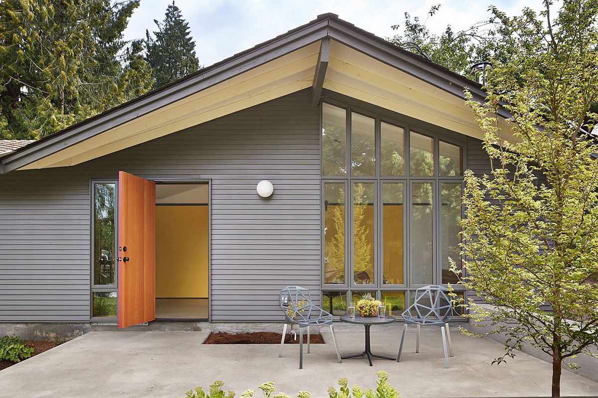 Gray exterior of the studio that was previously a horse stable before its current makeover