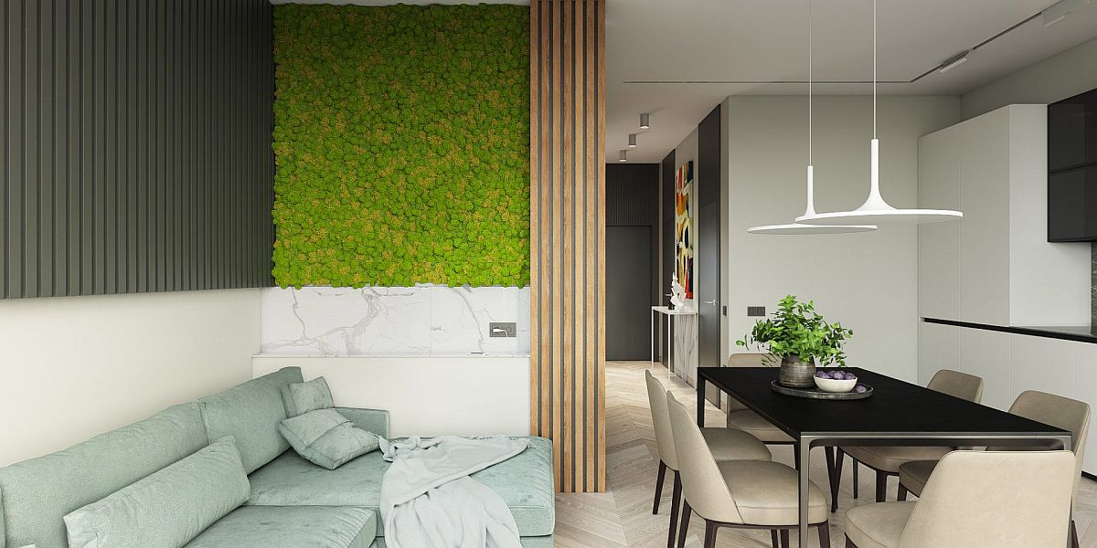 Green on the wall brings color to a backdrop that is clad largely in white and gray