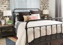 Guest-bedroom-with-wallpapered-backdrop-that-brings-brick-wall-and-barn-door-image-to-the-space-19939-217x155