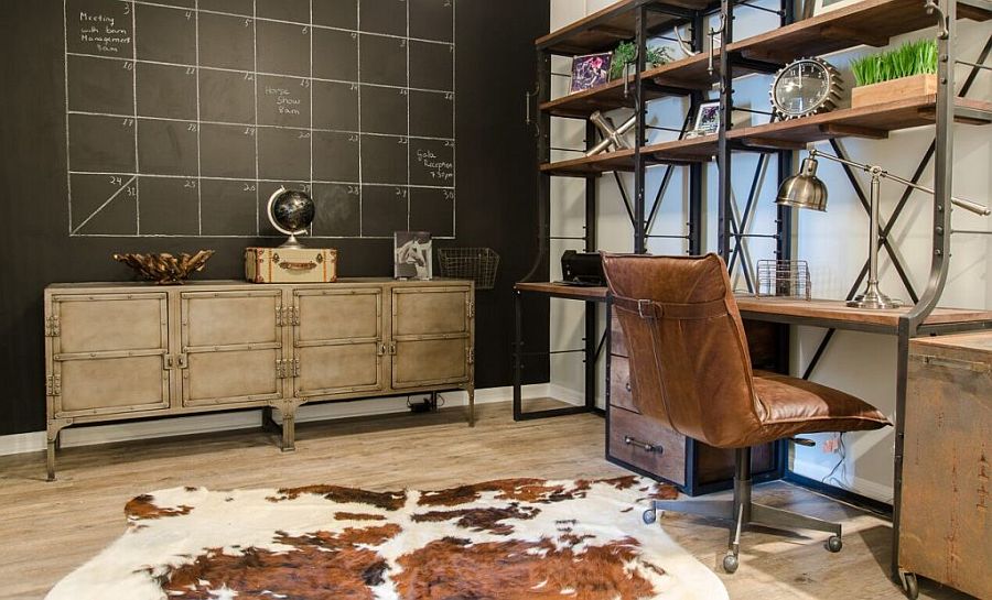 Industrial home office with chalkboard wall, cowhide rug and custom wood and metal furniture