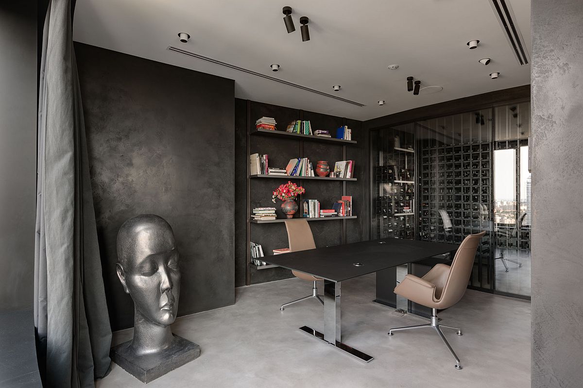 Inventive contemporary home office with textured walls and a dark desk that also adds to the color scheme