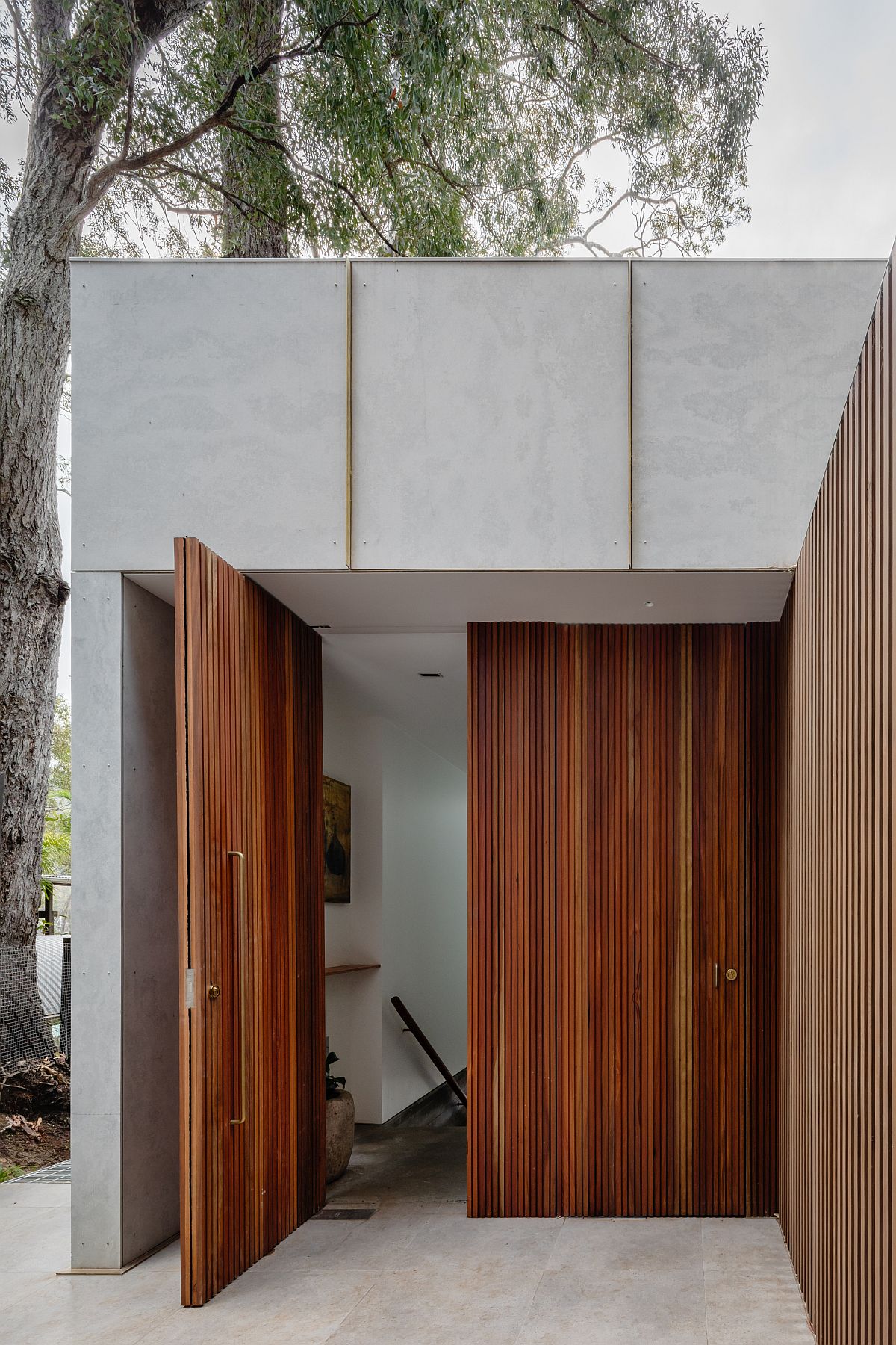 Large wooden doors welcome you at the contemporary Aussie home