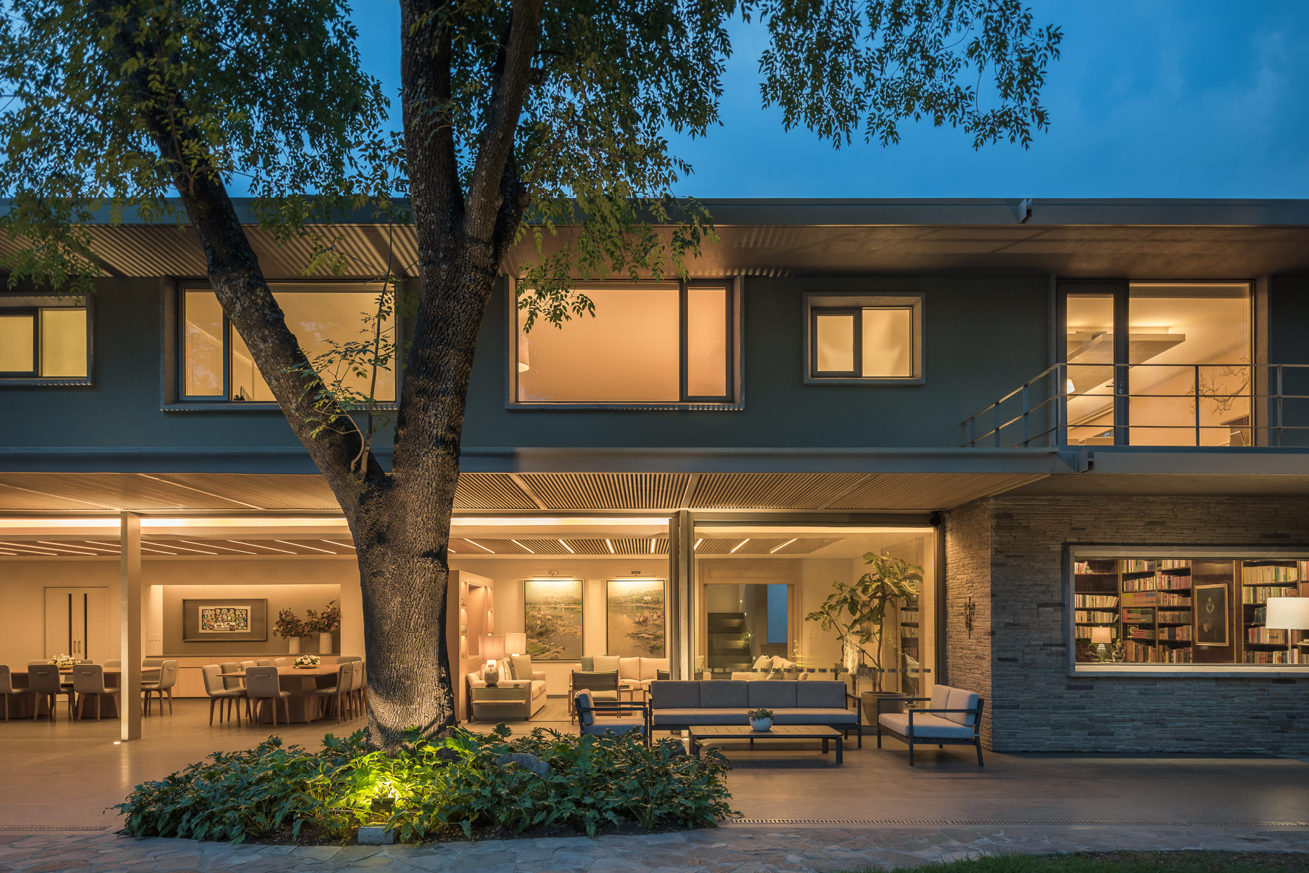 Lighting gives the expansive Mexican home a warm, modern glow