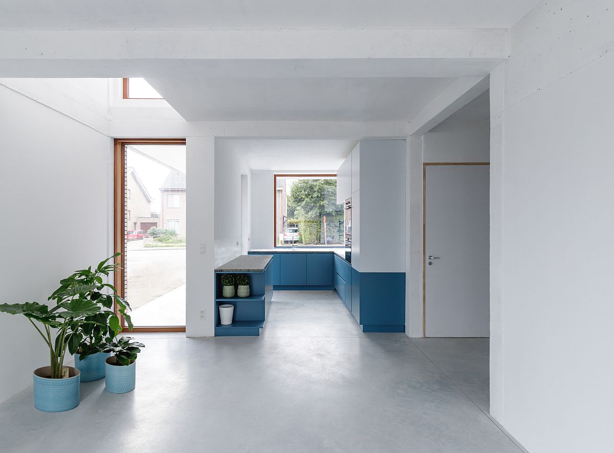 Look inside the house reveals a more minimal and contemporary interior in white