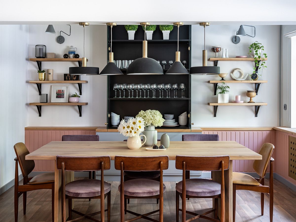 Modern and mid-century influences come together beautifully in this gorgeous dining room with open shelves