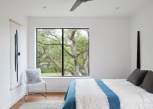 Modern-bedroom-in-white-of-the-Texas-home-with-simple-blue-accents-84049-217x155